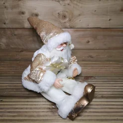 40cm Sitting Santa Christmas Decoration In White & Gold -Deals Christmas Decor Store 40cm sitting santa christmas decoration in white gold5056589184117 03c MP
