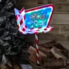 67cm Light Up Christmas Red White And Green North Pole Outdoor Sign With 35 Multi Colour LED Lights