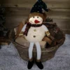 70cm Sitting Light Up Christmas Snowman With Dangly Legs In Warm White LEDs