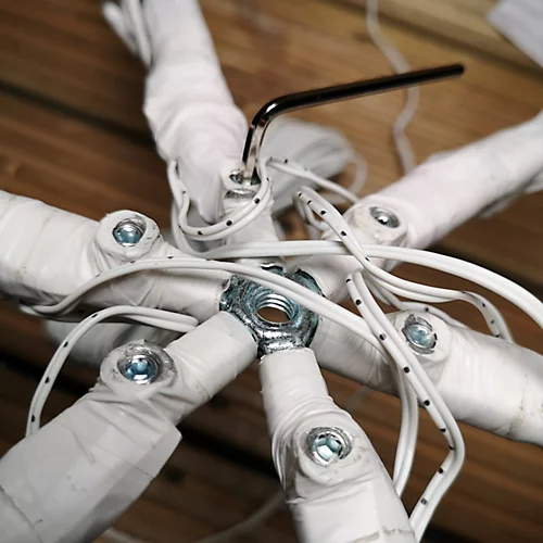 90cm Premier White Starburst Snowflake Christmas Decoration With Twinkling LEDs In Multicoloured 3 90cm Premier White Starburst Snowflake Christmas Decoration With Twinkling LEDs In Multicoloured - Image 3