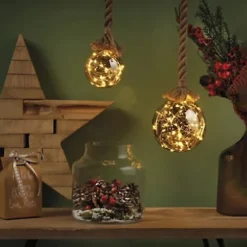 Large 14cm Christmas Hanging LED Ball On Rope Decoration With Smokey Glass - Battery Powered -Deals Christmas Decor Store large 14cm christmas hanging led ball on rope decoration with smokey glass battery powered5056337108594 02c MP