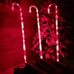 Set Of 3 1m Lit Outdoor Red & White Multi Function Christmas Candy Cane Stake Lights In Red
