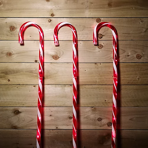 Set Of 3 1m Lit Outdoor Red & White Multi Function Christmas Candy Cane Stake Lights In Red 2 Set Of 3 1m Lit Outdoor Red & White Multi Function Christmas Candy Cane Stake Lights In Red - Image 2
